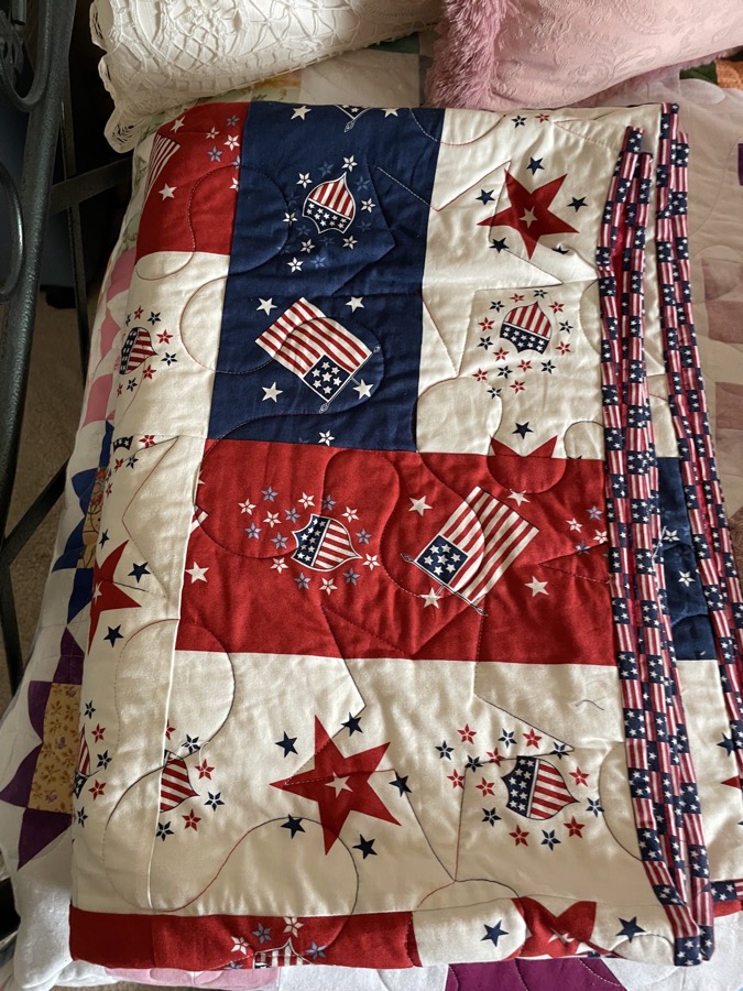 Quilt of Valor patriotic quilt red white and blue gifted to Tim by the QOV organization